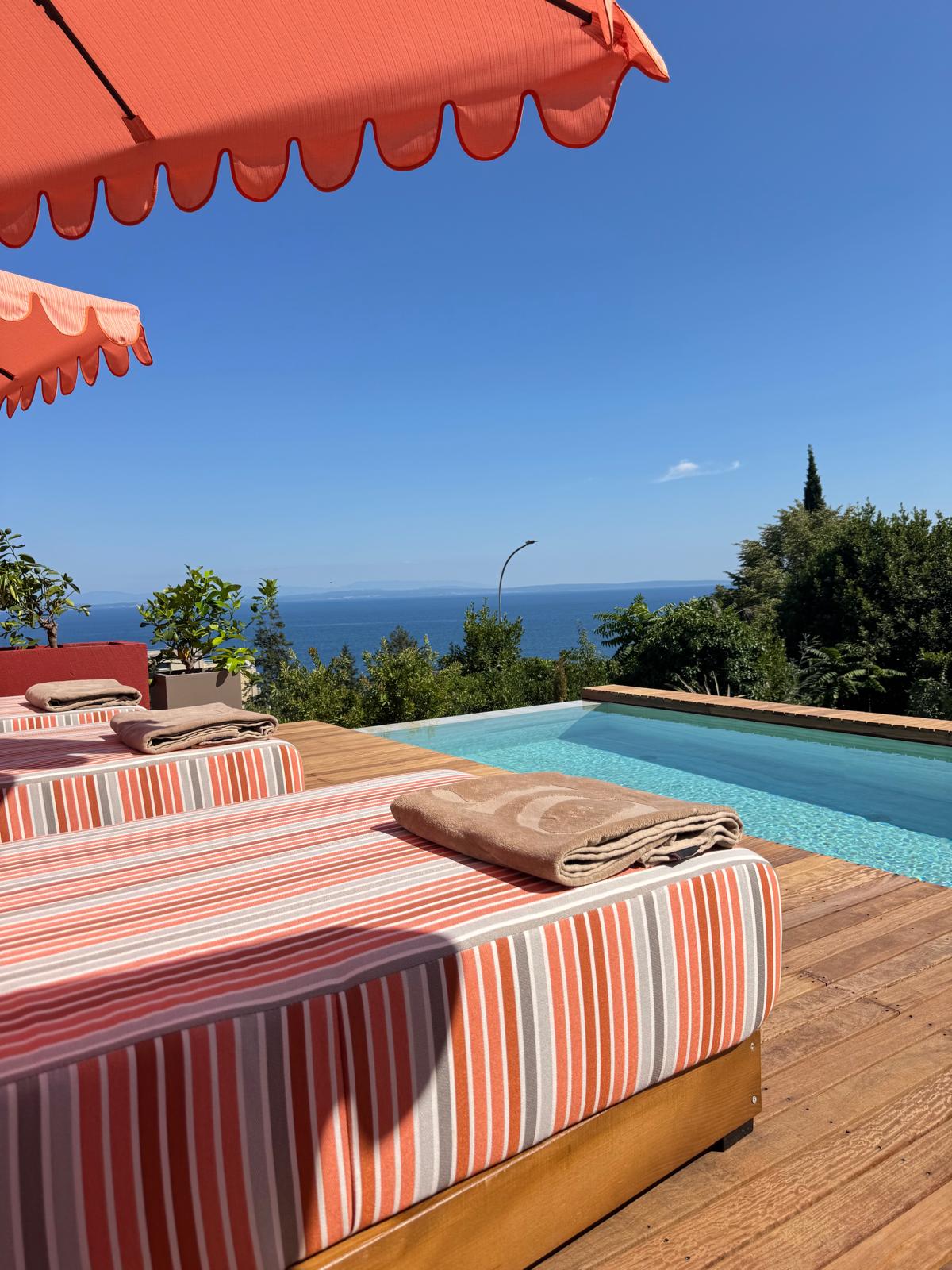 Private infinity pool and sun deck with sea views at IBoutique Luxury Villa Opatija